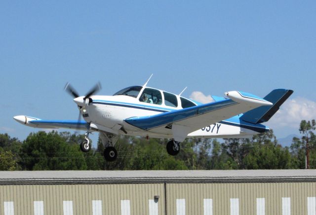 Beechcraft 35 Bonanza (N9657Y) - Taking off RWY 24