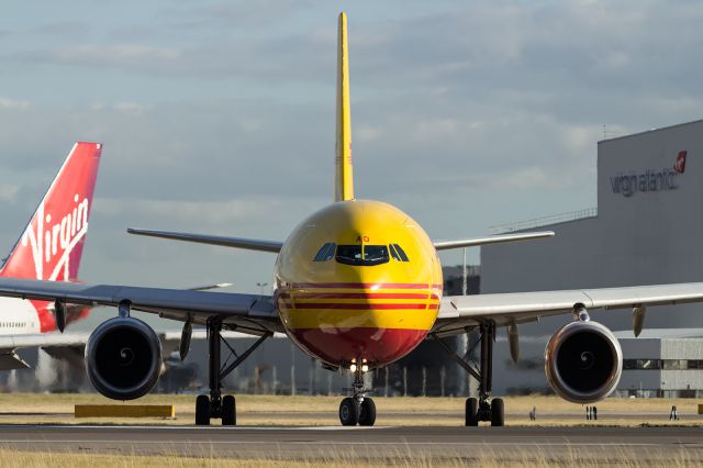 Airbus A300F4-200 — - DHL, Cargo, A300B4 lines up on runway 027R at LHR.