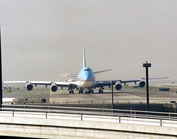 Boeing 747-400 — - KLAX- don't have the reg handy - but cool to see ther wingspan of this 747 400 taxi to 24 L for departure to HKG