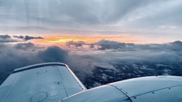 Piper Aztec (N6854Y) - Stormy sunrise flight.