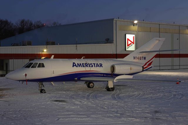 Dassault Falcon 20 (N148TW) - An Ameristar Falcon Jet on the Grand Aire ramp on balmy 11 deg F/wind chill of 5 deg F just before sunrise, 25 Jan 2022.