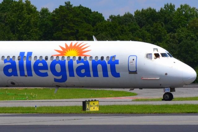 McDonnell Douglas MD-80 (N419NV) - Taxiing in with the cockpit window open at KJQF - 8/6/18