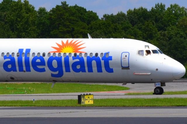 McDonnell Douglas MD-80 (N419NV) - Taxiing in with the cockpit window open at KJQF - 8/6/18