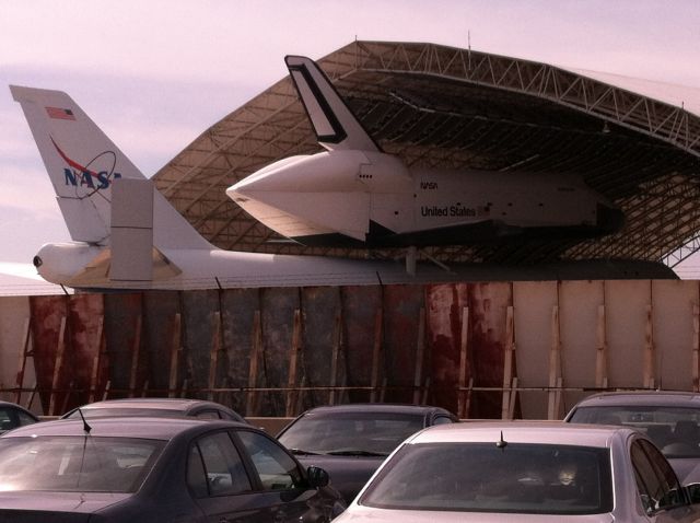 — — - Old 747 with the space shuttle parked at JFK airport