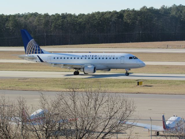 Embraer 170/175 (N652RW) - United Express (Republic Airlines) flight 3289 to Newark Liberty Intl, an Embraer 175 taxiing to takeoff on runway 23R. This was taken January 30, 2016 at 4:03 PM.