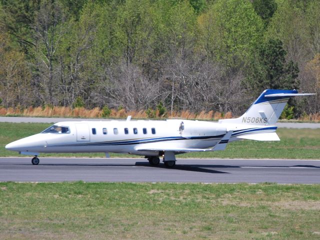 Learjet 40 (N506KS) - WAL-MART STORES INC departing 20 at KJQF - 4/6/11