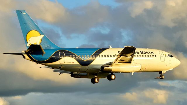 Boeing 737-200 (C-GSPW) - This flight from CYFB usually arrives at 4:30PM. But today it came in just past 8:00PM, under beautiful cloud and sunset condition.