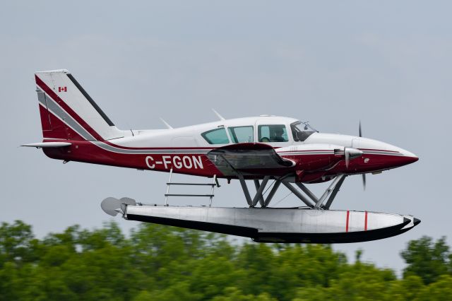 Piper Aztec (C-FGON) - Fly past at Orillia seaplane base.