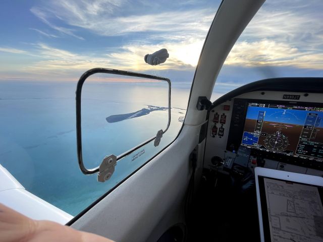 Mooney M-20 (N993JT) - Framing the photo. Bimini, Bahamas