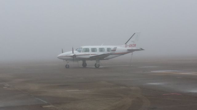 Piper Navajo (C-GKCN) - Galveston had quite a lot of fog for a few days in a row. 