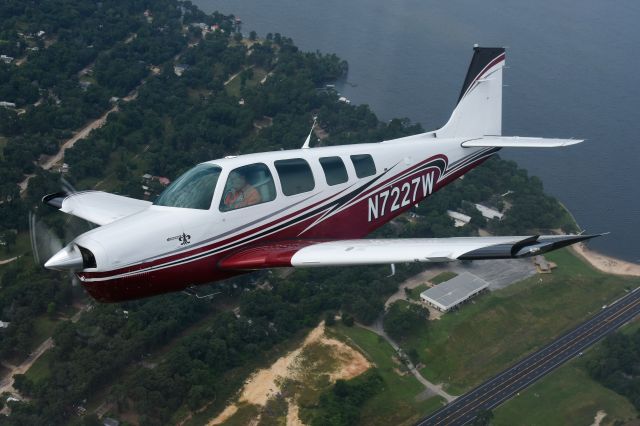 Beechcraft Bonanza (36) (N7227W) - Formation flight preparing for the mass arrival of Beechcraft at EAA AirVenture 2024. 