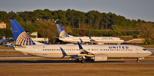 Boeing 737-900 (N31412) - United Airlines 737-900 taxiing to it's runway assigned to them at Bush Intecontinental Airport (IAH).  Houston, Tx.