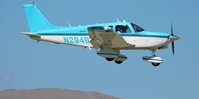 Piper Dakota / Pathfinder (N294BJ) - A Piper Dakota (N294BJ) is snapped here as it covers the final four hundred feet of a midafternoon approach to Yerington (Nevada) Municipal.