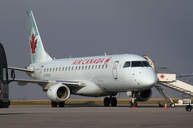 Embraer 170/175 (C-FFYG) - This neat Embraer (Fleet # 385) was serving under charter as transport for Leonard Cohen, who had performed in Kingston the night before..