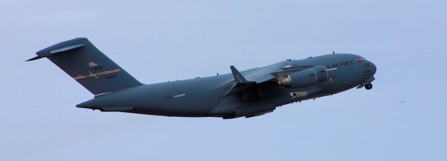 Boeing Globemaster III — - C-17 nice angle of her still cleaning up as she gains speed and altitude.