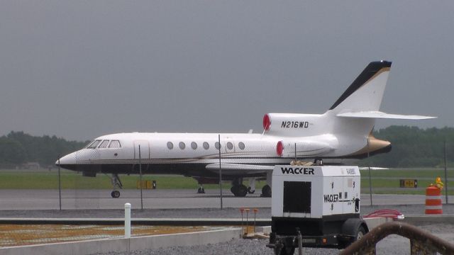 Dassault Falcon 7X (N216WD) - A Dassault Falcon 50 sitting on the ramp in Watertown NY (KART).