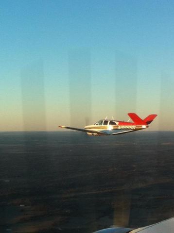 Beechcraft 35 Bonanza (N9899R) - I was flying 9899R and my Cousin snapped this picture from his Baron