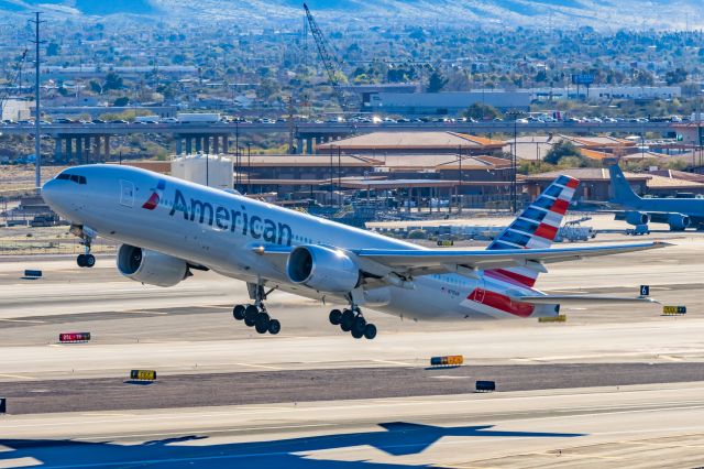 Boeing 777-200 (N776AN) - An American Airlines 777-200 taking off from PHX on 2/9/23 during the Super Bowl rush. Taken with a Canon R7 and Tamron 70-200 G2 lens.