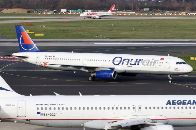 Airbus A321 (TC-ONJ) - KAFA RADIO marks on the nose