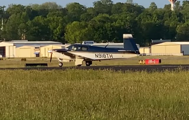 Mooney M-20 (N918TH) - Mooney M20 taxiing at Greenville Downtown Airport