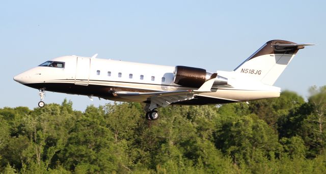 Canadair Challenger (N518JG) - Joe Gibbs Racing's Bombardier Challenger 604 departing Boswell Field, Talladega Municipal Airport, AL, after the NASCAR GEICO 500 race at Talladega Super Speedway - late afternoon, April 25, 2021.