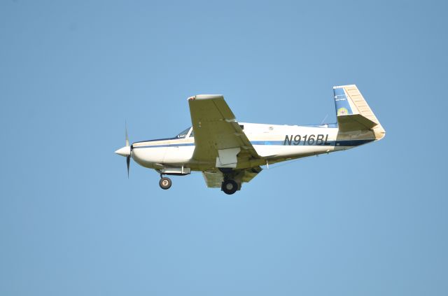 Mooney M-20 Turbo (N916BL) - Final approach to runway 36 at Airventure 2018.