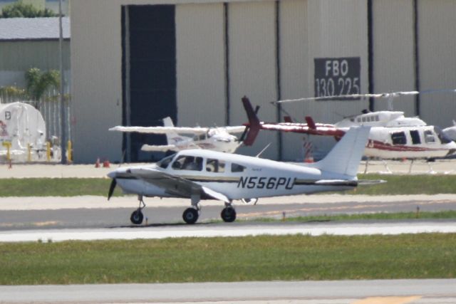 Piper Cherokee (N556PU) - Piper Cherokee (N556PU) arrives on Runway 32 at Sarasota-Bradenton International Airport