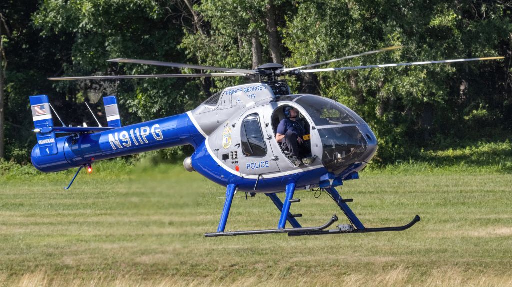 MD HELICOPTERS MD-520N (N911PG) - N911PG hover-backtracking to College Park Airport's runway 33