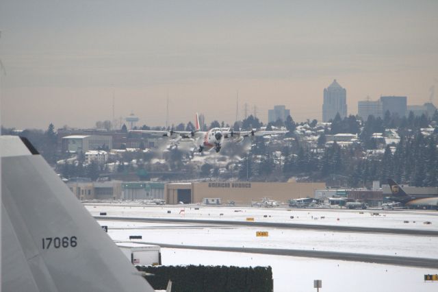 Lockheed C-130 Hercules — - USCG C130 taking off from Boeing Field 12-20-2008.