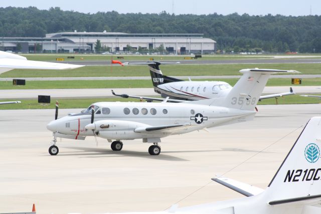 Beechcraft Super King Air 200 — - UC-12F from MCAS New River taxiing to runway 5R