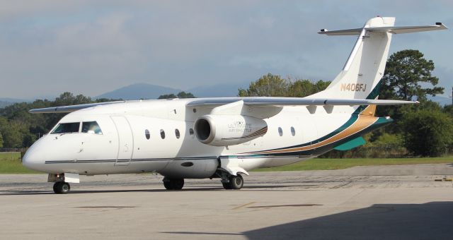 Fairchild Dornier 328JET (N406FJ) - An Ultimate Jetcharter Dornier 328-300 taxiing along the general aviation ramp at Anniston Regional Airport, AL - October 12, 2017.