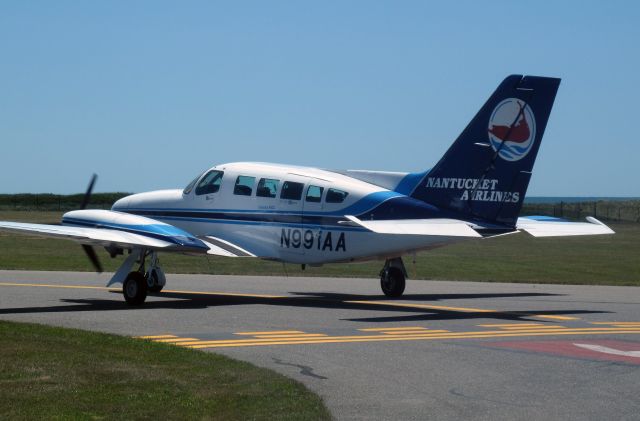 Cessna 402 (N991AA) - One of many, many take offs on this day...