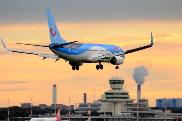 Boeing 737-800 (OO-JAV) - Thats the tower of Tegel in the background