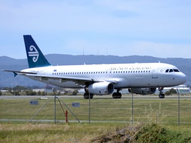 Airbus A320 (ZK-OJO) - On taxi-way heading for take off on runway 05.