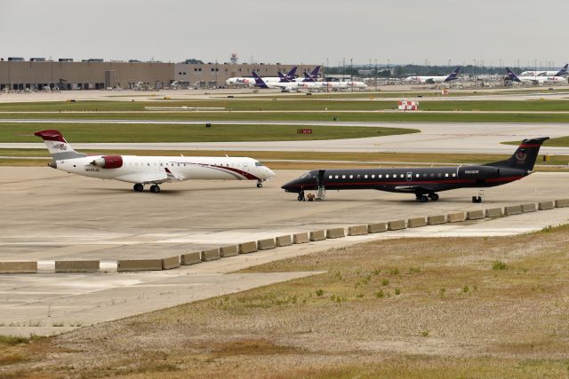 Canadair Regional Jet CRJ-700 (N520JG) - Two of the last to depart racing team aircraft. 08-15-21