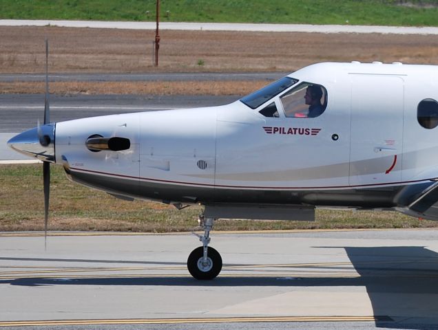 Pilatus PC-12 (N32NG) - SHOTTENKIRK HOLDINGS LLC taxiing at KPDK - 4/6/13