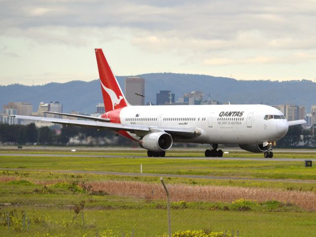 BOEING 767-300 (VH-ZXC) - On taxi-way heading for take off on runway 05, for flight to Sydney. Thursday 12th July 2012.