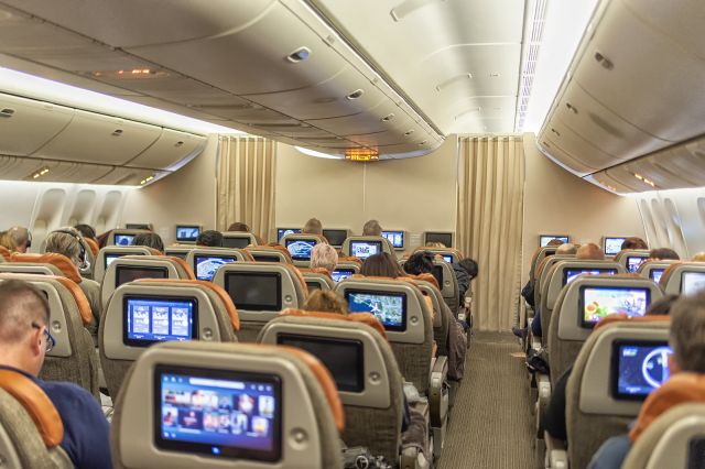 BOEING 777-300 (B-16730) - 11th March, 2023: 2-4-2 seating configuration in Premier Economy class cabin on board Eva Air flight BR68 operated by a Boeing 777-300ER from London Heathrow to Bangkok Suvarnabhumi. 