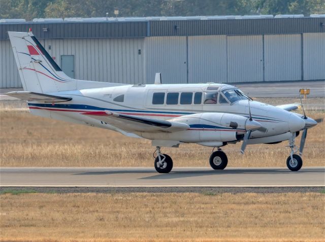 Beechcraft Ute (U-21A/G) (N32P) - Beech A90 at Livermore Municipal Airport. August 2020