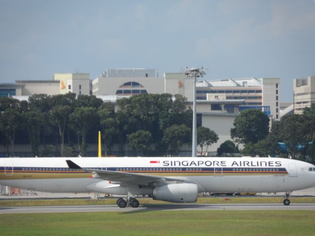 Airbus A330-300 (9V-STI) - 9V-STI taxying to runway 20C for take-off, WSSS