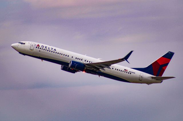 Boeing 737-900 (N838DN) - Purple skies on a nice evening, here's a Delta 739 taking off from SLC.