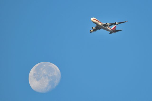 Boeing 747-400 (N700CK) - And one flew over the moon. Early morning arrival. Over the top of ORD on downwind at around 9000' or so for 28-C on 10-23-21