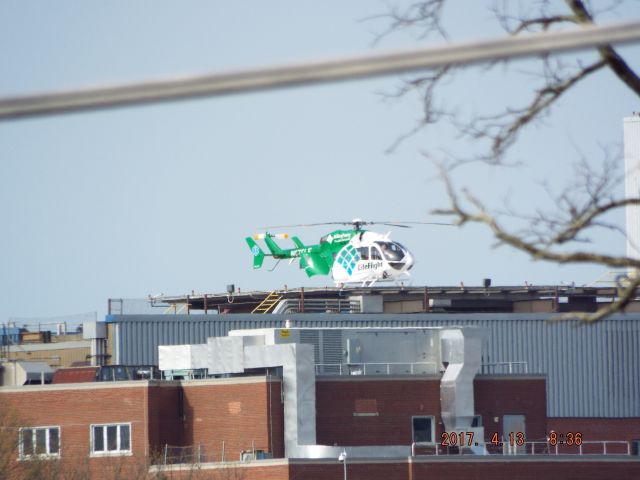 KAWASAKI EC-145 (N676LF) - Allegheny Health Network LifeFlight 5 sitting on the pad at Excela Health Westmoreland Hospital. Taken on April 13, 2017.