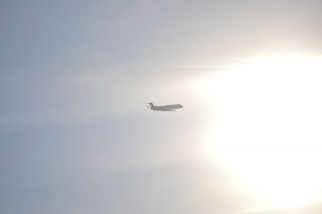 Canadair Regional Jet CRJ-700 (N518AE) - Flying into the sun after departure... Sure hope the pilots remembered their sunglasses.