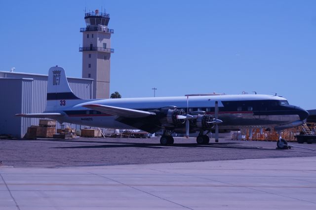 N4887C — - After serving for many years as an spray aircraft, Delta re-acquired their DC-7C for preservation at Atlanta in the Delta Museum.  Caught it one afternoon at Mesa-Gateway AZ, October 3rd 2019.