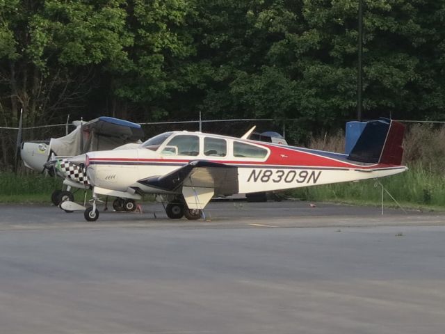 Beechcraft 35 Bonanza (N8309N) - Nice v-tail Bonnie.