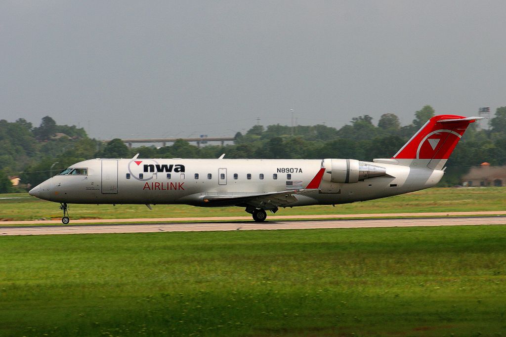 Canadair Regional Jet CRJ-200 (N8907A) - "Flagship 3748" is pictured seconds after touchdown on runway 25.