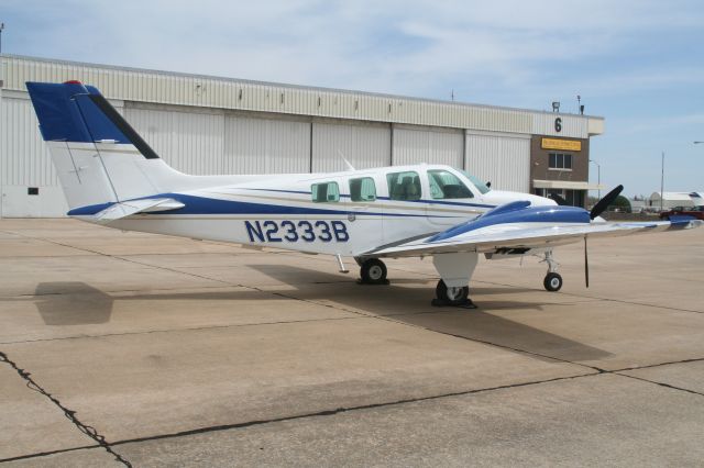 Beechcraft Baron (58) (N2333B) - AT WILEY POST AIRPORT