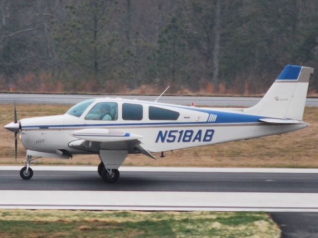 Beechcraft Bonanza (33) (N518AB) - AIR AMG LLC / Arriving runway 20 - 3/11/10