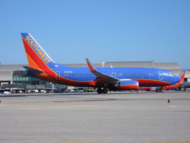 Boeing 737-700 (N245WN) - Holding on RWY 19R